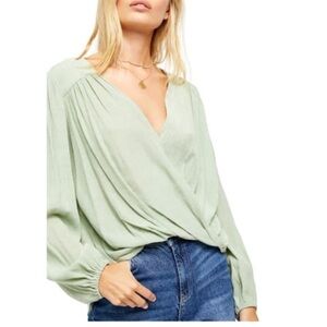 BrandNWOT Free People high low drape wrap green top, size XS, pit to pit 18”